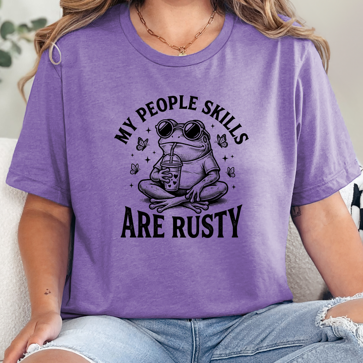 Wholesale People Skills are Rusty Graphic Tee - Heather Team Purple Tee
