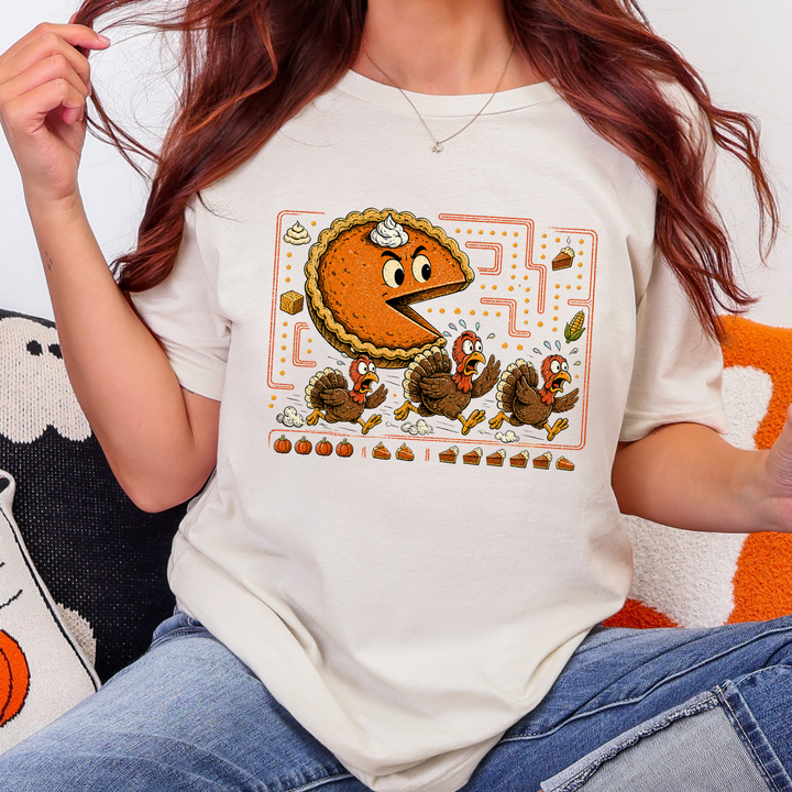 Wholesale Thanksgiving Pie Chasing Turkey Graphic Tee - Natural