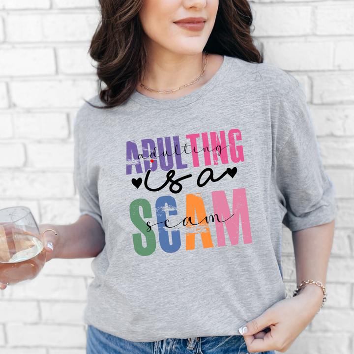 Adulting is a Scam Graphic Tee